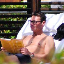 Live's Ryan Seacrest, 48, and Aubrey Paige, 25, enjoy steamy Miami getaway as model strips down to tiny bikini at pool