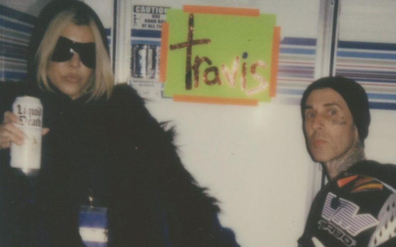 Kourtney Kardashian & Travis Barker make out and pack on the PDA in over-the-top new pics from his Coachella performance