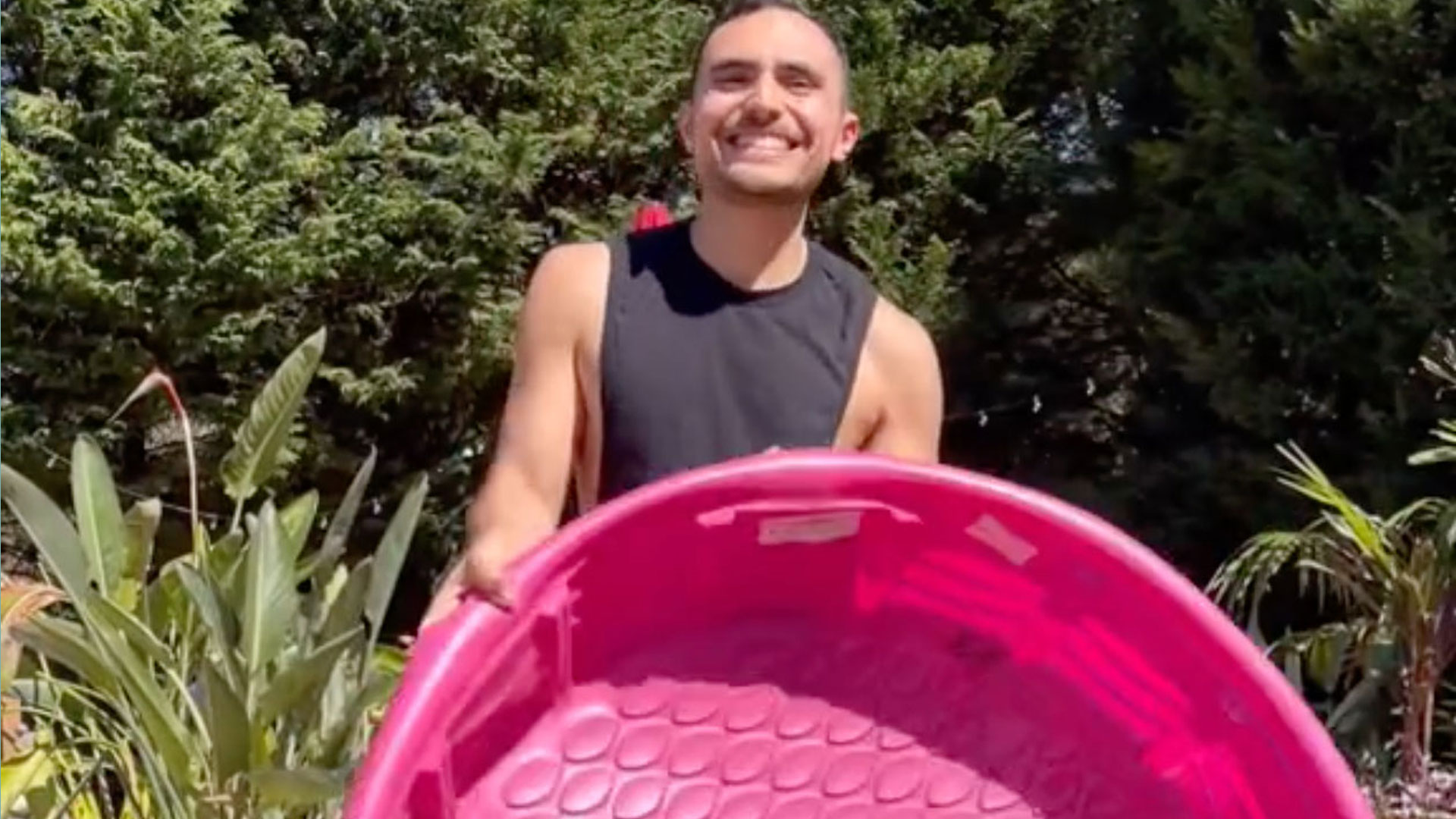 I use an 'aggressively pink' kiddie pool as a gardening tool - it was only $5 and keeps my deck clean